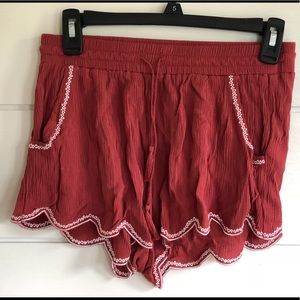 Orange detailed flowy shorts